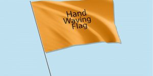 Image of Hand waving flags are small, portable flags attached to a handle or stick